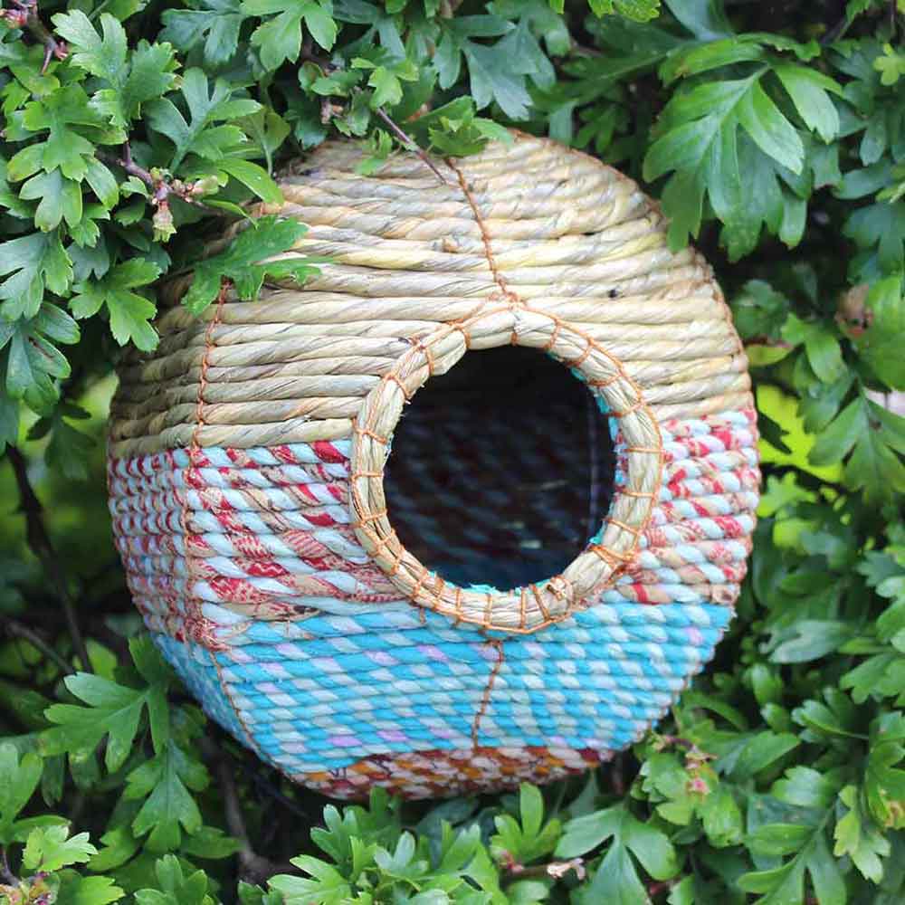 Woven nest box for birds